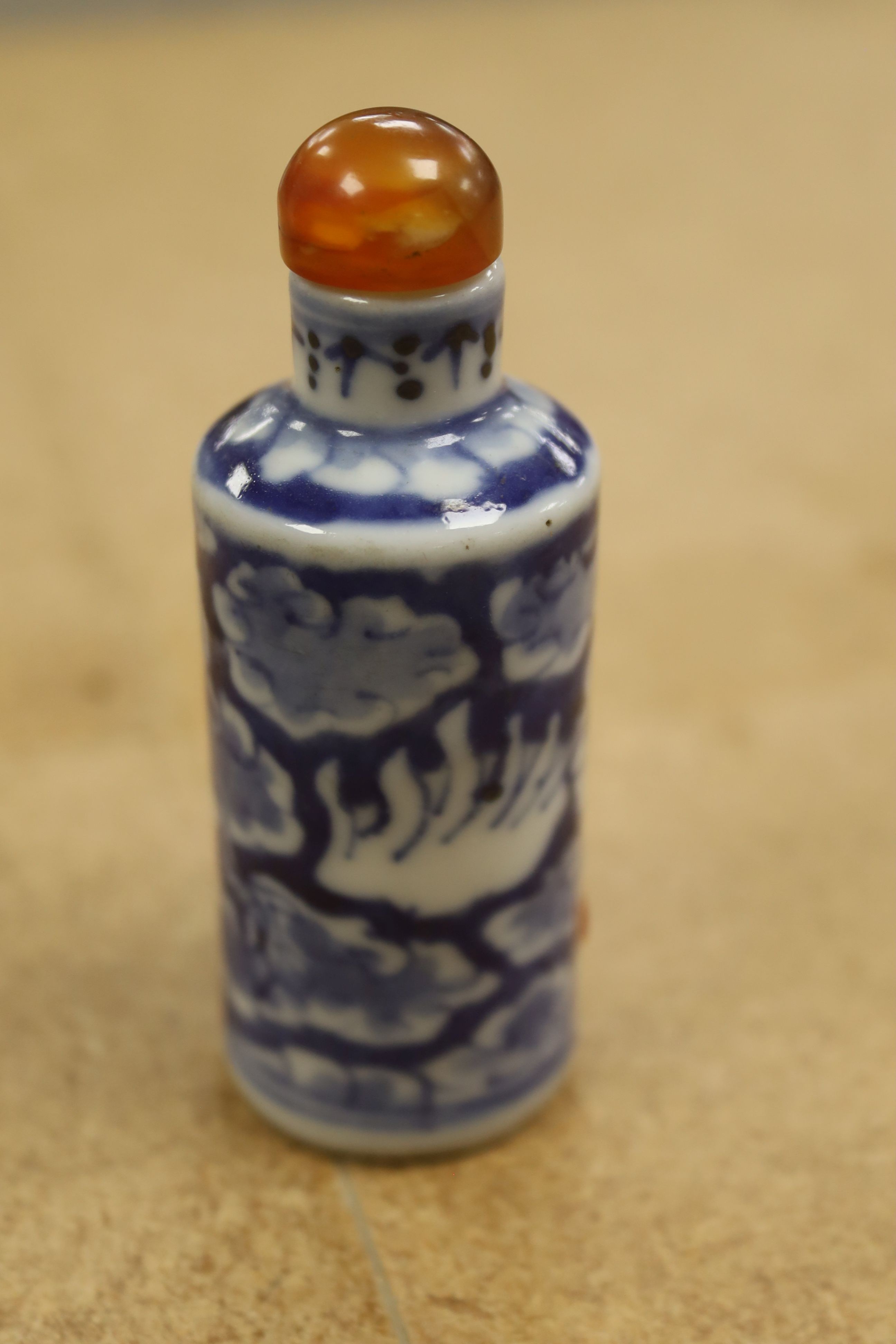 A Chinese blue and white snuff bottle, 9cm high including stopper